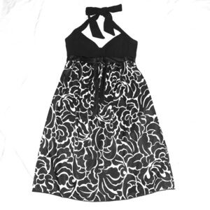 Intrigue size M black & white floral tie back sleeveless halter w bow mini dress